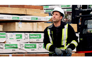 Standard Building Supplies crane operator Jesse Gale delivering building materials to a construction site in Metro Vancouver
